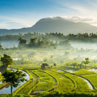 Scenic view of Sidemen Valley rice terraces with Mount Agung in the background, East Bali