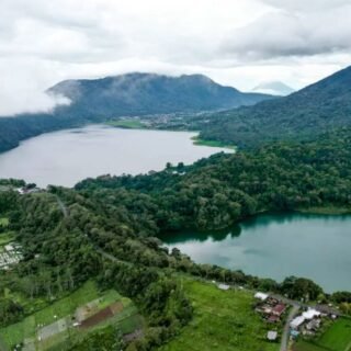 Scenic Twin Lake View of Buyan and Tamblingan Lakes surrounded by lush mountains in Bali